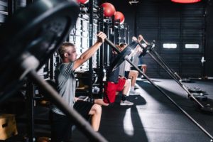 strength training on weights at Raleigh gym